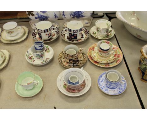 Nine antique cups and saucers & blue and white egg cups