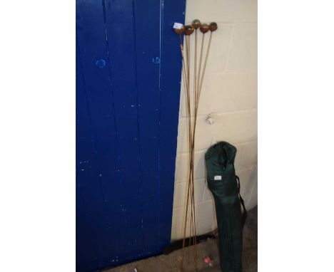 Group of six iron and glass garden stake ornaments