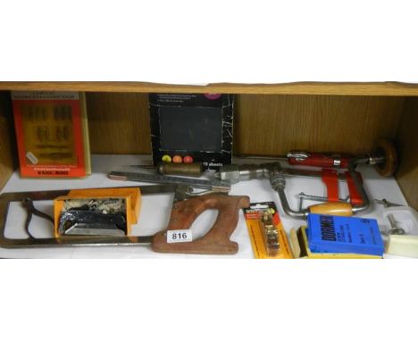 A shelf of assorted tools.