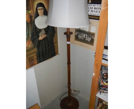 A solid oak standard lamp, COLLECT ONLY.