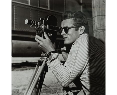 SID AVERY (1918 - 2002)  JAMES DEAN:  a giclee black and white portrait print of James Dean with a Bolex camera on the Marfa,