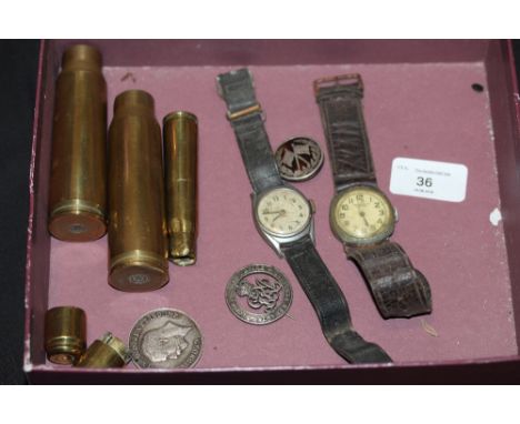 Two WWI wristwatches, a WWI War medal 8946 Pte R Wright, Manchester Regiment, a silver and tortoiseshell pique brooch depicti