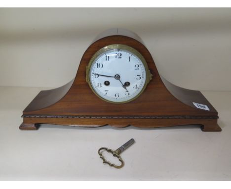 A mahogany mantle clock, 19cm tall, working, polished case, chip to dial 