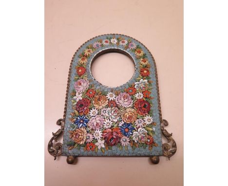 A micro mosaic picture frame / clock frame, 19cm tall, aperture 6.4cm, easel back missing, some minor losses 