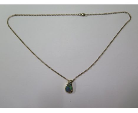 An 18ct yellow gold 750 opal pendant approx 2.2 grams on a hallmarked 9ct yellow gold 46cm chain, approx 2.8 grams, both good