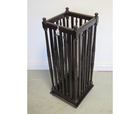 An early and unusual oak umbrella stick stand, the sides with alternating flat splats and bobbin turned spindles, drip tray o