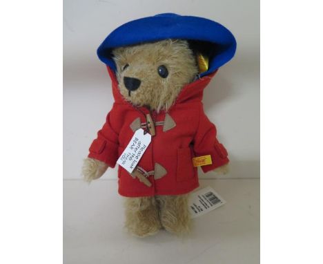 A Steiff Paddington 22 teddy bear with red coat 