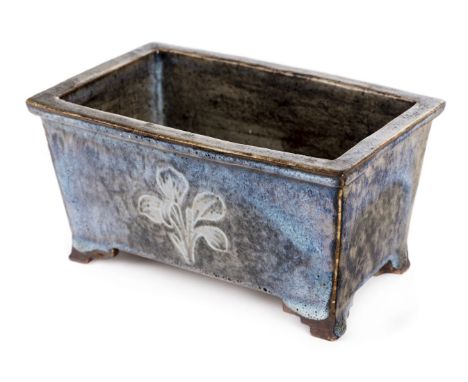 *Dalton (William, Bower 1868-1965). Rectangular stoneware planter,  with a flamb‚ glaze and floral design, base incised 'WD',
