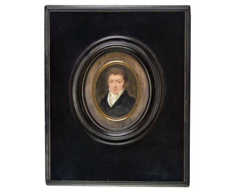 *Miniature. Oval portrait miniature of a young gentleman, circa 1820,  oval gouache portrait, showing a young man with brown 