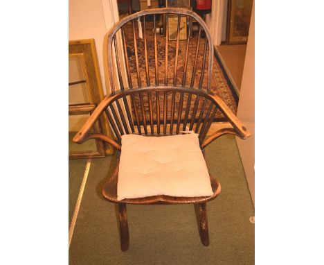 *Chair. 19th century elm stick back Windsor chair,  with arched back and curved arms, on tapered supports, 100cm high  (1)