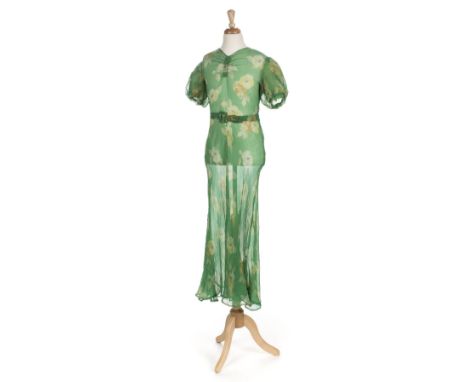 *Dress. A long green floral chiffon dress, 1930s,  hand-made dress, with ruched v-neck, puffed sleeves lined with green silk 