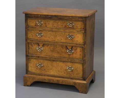 *Chest. Georgian style burr yew veneered bachelors chest,  with brushing slide above three drawers with pierced brass handles