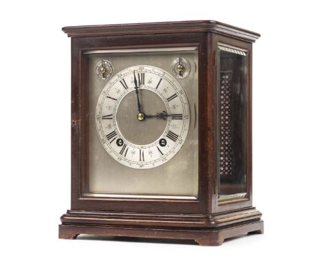 *Mantel Clock. An Edwardian mantel clock,  the silvered dial with chapter ring and black roman numerals, two winding holes an