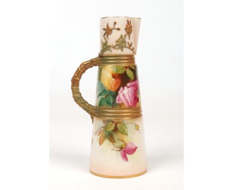 A Royal Worcester blush ware tapering ewer with bound branch formed handle. With gilt edging and painted with roses, signed A