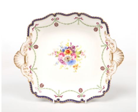 A Royal Worcester dessert dish by Ernest Phillips. With twin shell moulded handles and gadroon moulded rim edged in cobalt bl
