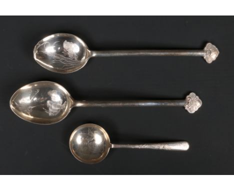 Two early 20th century Chinese silver spoons, each with a ruyi form terminal and engraved to the bowls, along with another Ch