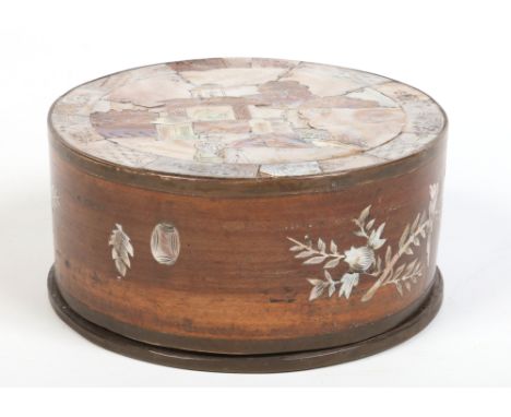 A 19th century Cantonese hardwood workbox of drum form with fitted internal tray and brass mounted edges. Inlaid with mother 
