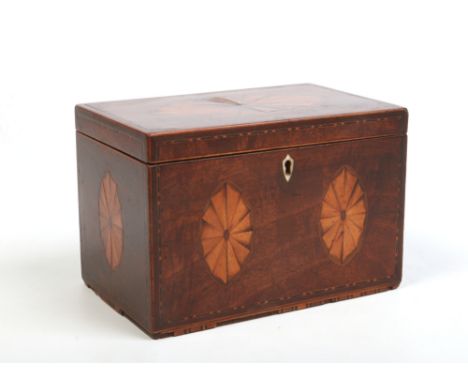 A Regency mahogany tea caddy with marquetry inlaid fan patera, 17cm wide.&nbsp;Condition report intended as a guide only.Some