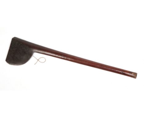 A Maori Tewhatewha club with axe shaped blade. Mainly plain with some remnants of detail at the pommel, 73.5cm.Condition repo