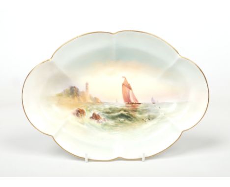 A Royal Worcester lobed dish by Raymond Rushton. With a gilt rim and painted to the centre with a coastal scene incorporating