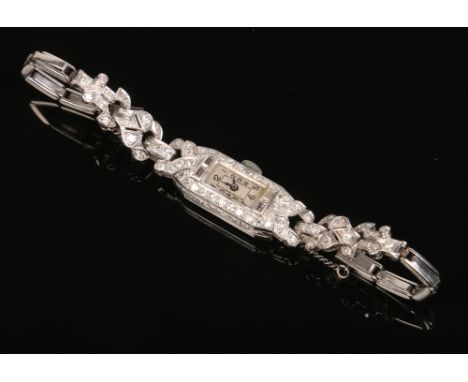 A ladies Art Deco Josarn platinum and diamond manual cocktail watch. Set with round and baguette cut diamonds and having rect