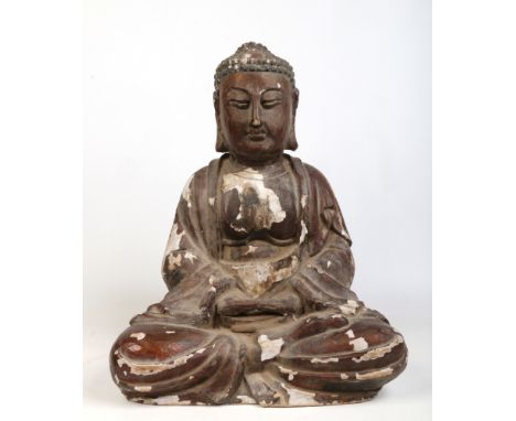 A large 19th century Chinese carved softwood and gesso statue of a seated meditating Buddha, 67cm.Condition report intended a