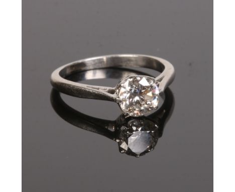 A white gold and diamond solitaire ring. Set with an old cut diamond, approximately 0.7ct, size H.Condition report intended a