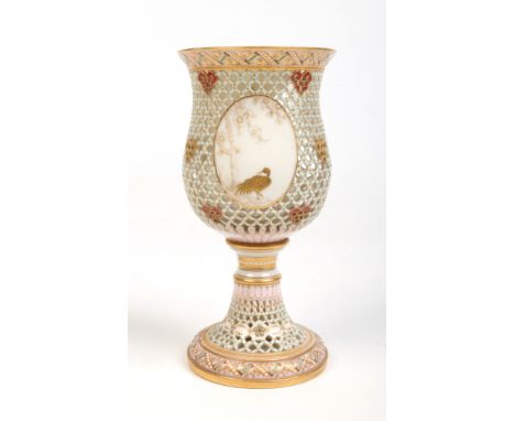 A Victorian Royal Worcester reticulated goblet vase in the manner of George Owen. With salmon ground borders, gilded and jewe