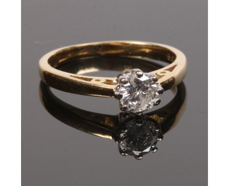 An 18 carat gold diamond solitaire ring. Set with a brilliant cut diamond approximately 0.5ct, size N.Condition report intend