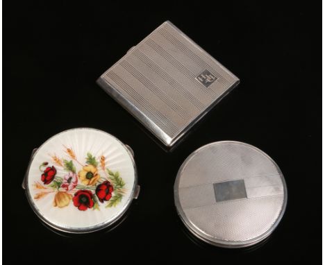 Three silver powder compacts, one with enamelled top depicting poppies on an engine turned ground by Turner &amp; Simpson, as