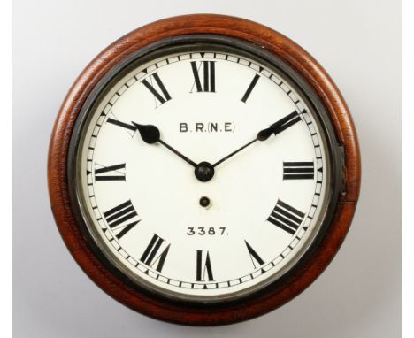 A 19th century oak cased fusee drop dial railway clock. With painted dial signed B. R. (N. E), 3387 and having Roman numeral 