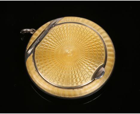 A George V silver powder compact by Horton &amp; Allday. Circular in form and with yellow guilloche enamel decoration. Assaye