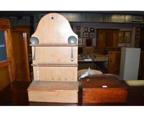 A 19th Century pine spoon rack with candle box below; and an oak box with sliding lid.  (2)