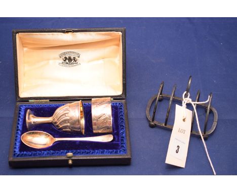 An Edward VII silver christening set, by Aitkin Brothers, Sheffield 1902, comprising: egg cup, napkin ring and coffee spoon, 