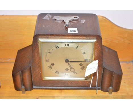 Art Deco oak case mantel clock, by The Northern goldsmith Company, Newcastle Upon Tyne.