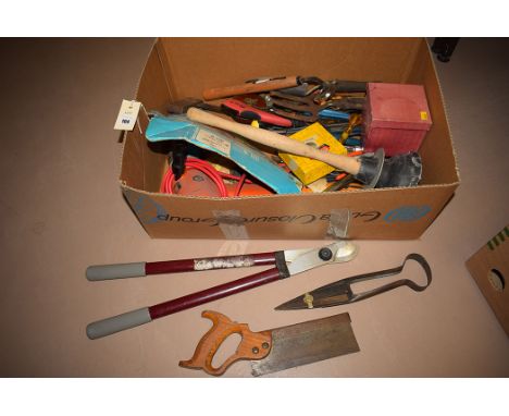 A quantity of hand tools, to include: a saw, sheep shearers; trowels; a Black & Decker power drill; and other items.