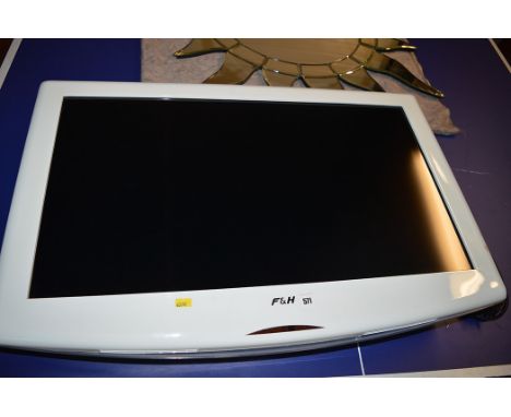 A Foehn & Hirsch 31in flat screen television, Model FH-32LMG, fitted wall brackets. 
