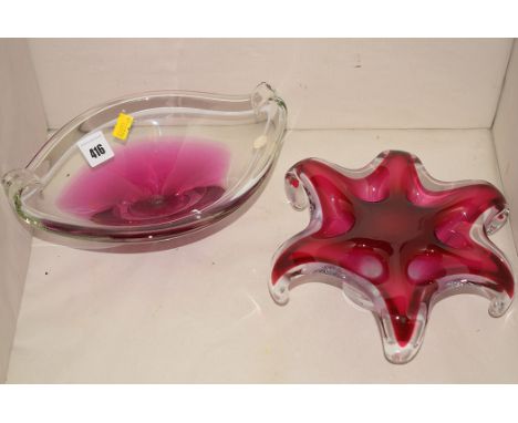 Paul Kedelv, for Flygsfors, Sweden: a Coquille pattern clear and pink glass bowl, of oval footed form and elliptical body wit