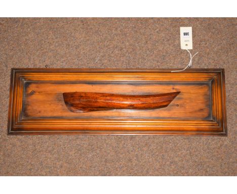 A Victorian style ship's half block wall model of a coble.