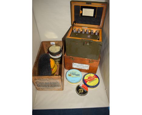 A German Army tactical radiation dosimeter set; a Namas calibration gauge; and a Colmans mustard wooden box with assorted tin