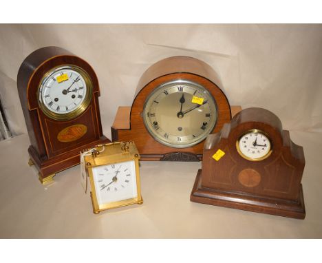 An Edwardian style mahogany mantel clock, roman dial; two other mahogany cased mantel clocks; and a brass carriage clock by L