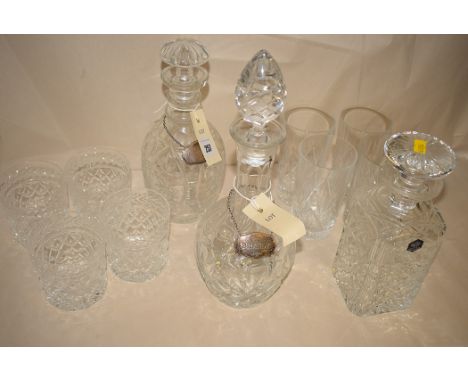 Stuart Crystal: a cut glass square decanter; two mallet shaped cut glass decanters each with silver decanter labels, 'Sherry'