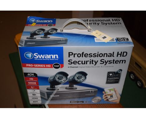A professional HD Security system, by Swann, four channel digital video recorder and two cameras, boxed.