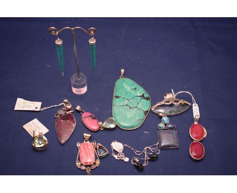 Silver jewellery set semi-precious stones including turquoise, ruby, quartz, rhodochrosite, udalite and others.