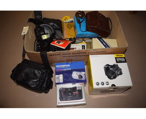 An Olympus C-220 Zoom digital compact camera; a Nikon Coolpix 5700; a Miranda Multi-dedicated 700CD flash; and other items.