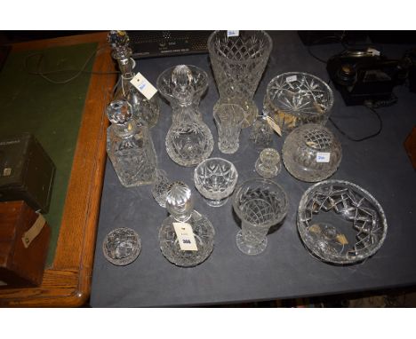 Cut glassware, to include: a decanter by Sterling; other decanters; circular bowls; a bell; and other items.