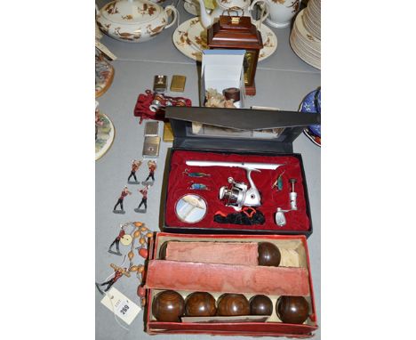 Early 20th Century table bowls; a mahogany mantel clock by Garrard & Co.; a pair of red enamel and gilt opera glasses; lighte