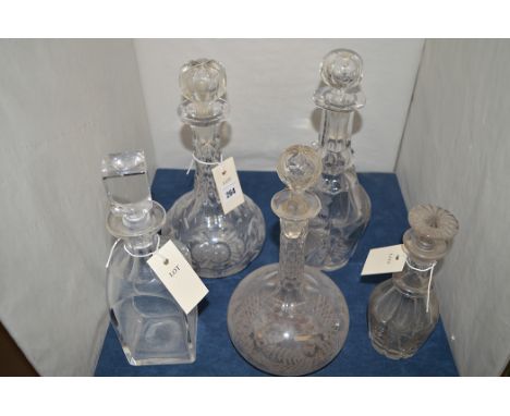 Four 19th Century cut glass decanters and stopper; together with a 20th Century decanter and stopper.  (5)