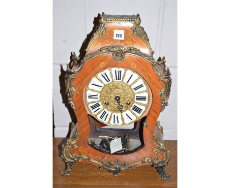An inlaid French style mantel clock with brass mounts, the movement stamped 'FHS, Germany'.