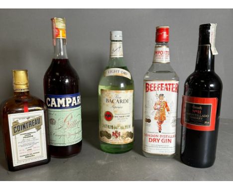A selection of spirits (5) Campari, Bacardi, Harrods No 11 Amontillado sherry, Beefeater gin, and Cointreau